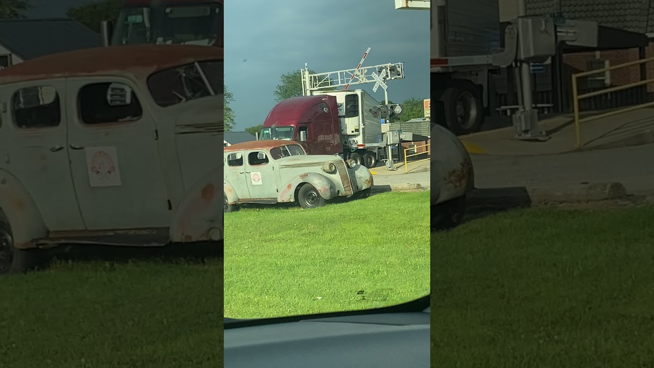 Semi-Trailer Truck Gets Plowed By Oncoming Train